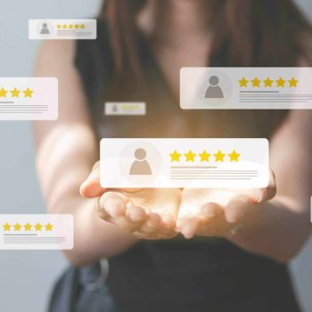 Business people using smartphone and pressing review popup on visual screen, customer review by five star feedback, positive customer feedback testimonial.
